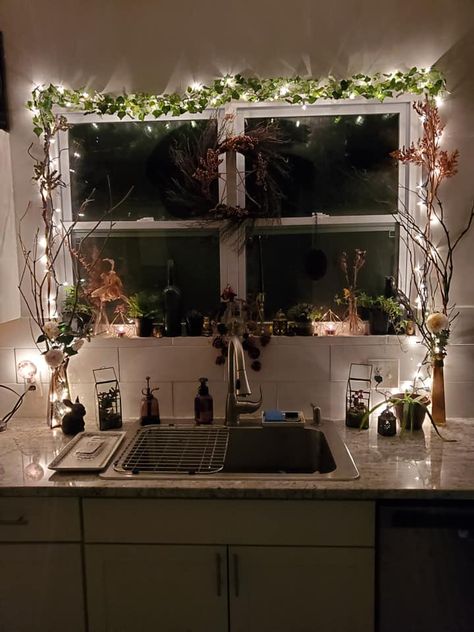 Vine and fairy lights over kitchen window Vine Lights Living Room, Fairy Lights Kitchen Window, Fairy Light Home Decor, Vines In Kitchen Aesthetic, Fairy Light Apartment, Fairy Lights Studio Apartment, Fake Window Decor Living Room, Fairy Light Bathroom Ideas, Fairy Lights Adult Bedroom