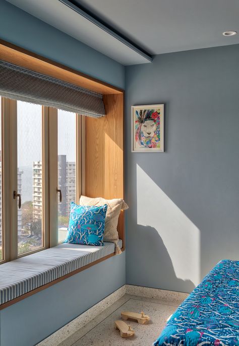 This sun-kissed South Mumbai home comes with gorgeous views of the city skyline | Architectural Digest India Window Side Sitting In Bedroom, Drawing Room Window Designs, Bedroom Window Seat Aesthetic, Dining Window Ideas, Window Sitting Ideas Indian, Window Side Seating, Window Sitting Ideas, Indian Window Design, Goa Villa