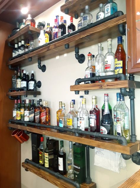 Industrial Rustic Bar, Bar Shelf Display, Shelves Behind Bar Ideas, Rustic Bar Shelves Ideas, Whiskey Glass Display, Behind Bar Shelving Ideas, Basement Bar Shelves Ideas, Bar Shelving Ideas Liquor, Industrial Liquor Shelves