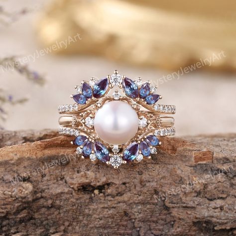 Vintage Pearl Engagement Ring Set Solid Gold Alexandrite Ring Pearl Ring Bridal Set Enhancer Wedding Band Stacking Ring Set Anniversary gift Only 1pcs Engagement Ring: https://www.etsy.com/listing/1560513803 Only 1PCS Wedding Band: https://www.etsy.com/listing/1749587783  💎RING DETAILS  Material: 10K/14K/18K yellow gold, white gold, and rose gold are available. (Other metals and stones are also available, please feel free to contact me directly for sterling silver or platinum.) ------ ENGAGEMEN Pearl Ring Blue, Luxury Pearl Ring With Halo Setting For Anniversary, Ocean Themed Engagement Rings, Sapphire And Pearl Ring, Engagement Ring With Pearls, Pearl Wedding Ring Set, Pearl Engagement Ring Vintage, Pearl Engagement Ring Set, Enhancer Wedding Band