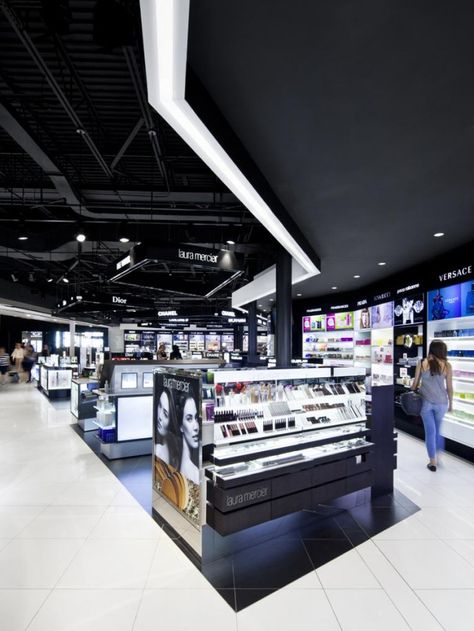 Redevelopment of the International Commercial Sector and Duty Free Shop at the Montreal-Trudeau Airport - Jodoin Lamarre Pratte architectes inc. Duty Free Store, Shopping Mall Interior, Airport Shopping, Duty Free Shop, Base Building, Pharmacy Design, Organization And Management, Building Architecture, Showroom Design