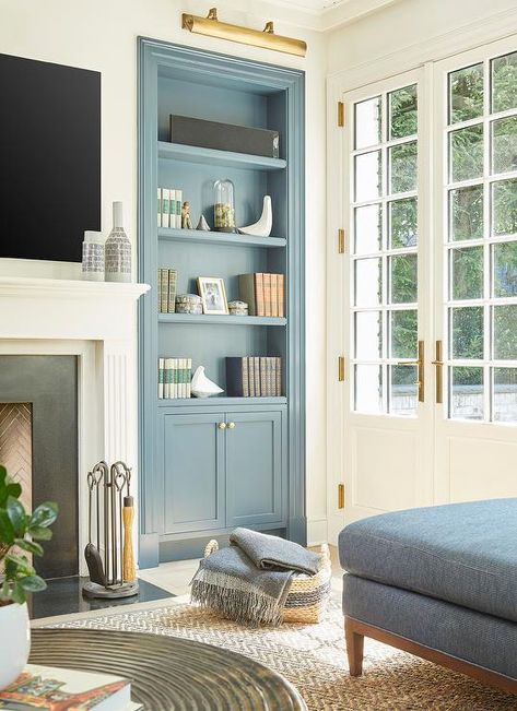 Built In With Library Lights, Recess Shelving Living Room, Colorful Built Ins Around Fireplace, Single Built In Bookcase, Blue Built Ins Fireplace, Light Blue Built In Bookcase, Blue Bookcase Living Room, Shallow Built In Bookcase, Recessed Built In Shelves Living Room