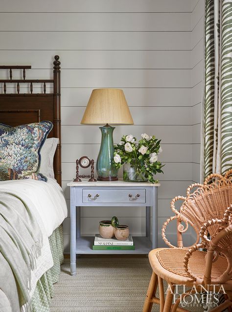 Inside the primary bedroom, Williams created a calm oasis through a palette of soft blues and greens. Texture is introduced through a wicker chair found at Acquisitions. Southern Landscape, Cottage Remodel, Colorful Rooms, Atlanta Homes And Lifestyles, Nantucket Cottage, Harbour Island, Student House, Atlanta Homes, Space Room