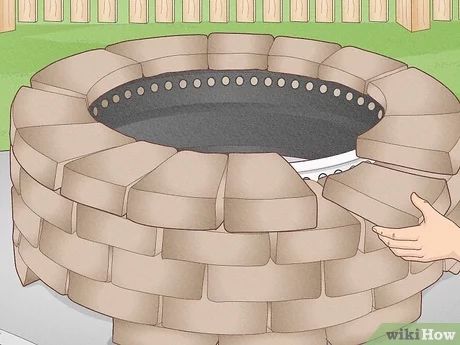 How to Make a Smokeless Fire Pit: 2 Easy Methods Diy Fire Pit Smokeless, Diy Smokeless Fire Pit Plans, How To Build A Smokeless Fire Pit, Smokeless Fire Pit Ideas Backyard, Smokeless Fire Pit Diy, Easy Fire Pit Ideas, Making A Fire Pit, Dyi Fire Pit, Outdoor Fire Pit Diy