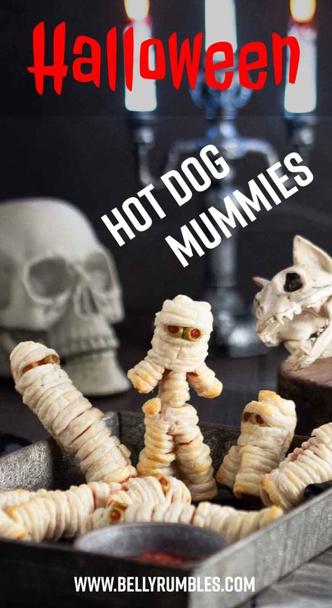 Halloween Mummy hot dogs are easy to make, look cute, and are pretty tasty too. Only four easily available ingredients are needed. Make mini ones or go all out and make them with arms and legs. Halloween Mummy Hot Dogs, Halloween Hotdogs, Mummy Hot Dogs, Wrapped Hot Dogs, Taco Wraps, Mummy Dogs, Halloween Entertaining, Hot Dog Recipes, Halloween Cocktails