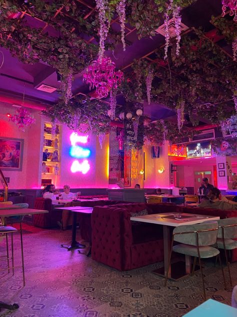 Neon Restaurant Aesthetic, Pink Mexican Restaurant, Bar With Neon Lights, Trippy Restaurant, Cute Restaurant Aesthetic, Neon Light Restaurant, Alice In Wonderland Coffee Shop, Pink Bar Aesthetic, Neon Restaurant Interior