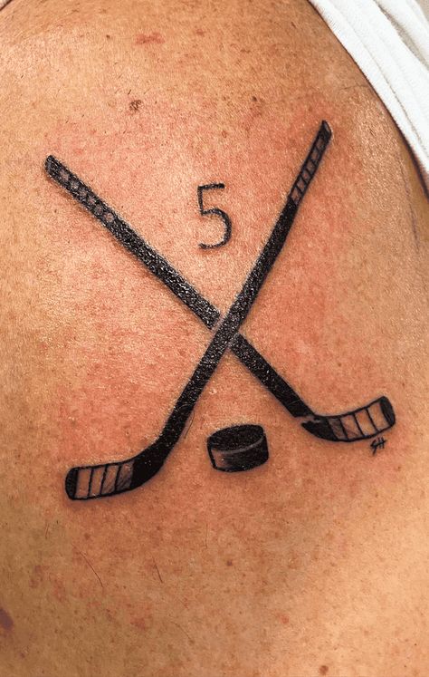 Hockey Tattoo Design Images (Hockey Ink Design Ideas) Hockey Inspired Tattoos, Hockey Stick Tattoo Ideas, Tatoos Hockey Tattoo Ideas, Small Hockey Tattoos Simple, Hockey Mom Tattoo Ideas, Hockey Tattoo Ideas For Guys, Hockey Tattoo Ideas For Women, Simple Hockey Tattoo, Ice Hockey Tattoo Ideas