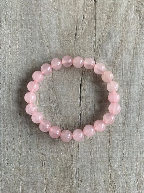 Beautifully Handmade beaded gemstone bracelet for both Men and Women. This Bracelet is made from genuine high quality Rose Quartz Beads. ♡ This bracelet brings you love and luck. It is a lovely bracelet for yourself or a gift for a loved one. ♡ ♡ Rose quartz is the stone of universal love. It is also the stone of love in marriage. When worn in jewellery the wearer feels a sense of self-worth. It opens the heart to compassion for self and for others, and raises self-esteem. ♡ All of our items are Love In Marriage, Pink Quartz Bracelet, Pink Crystal Bracelet, Rose Quartz Mala, Chakra Heilung, Crochet Bracelet Pattern, Crochet Necklace Pattern, Crystal Bead Jewelry, Good Luck Bracelet