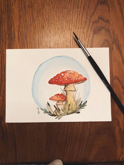 Watercolor mushrooms on watercolor board. Watercolor Ideas Mushroom, Paintings Ideas Mushrooms, Watercolor Art Fairycore, Watercolor Mashrom, Cute Mushroom Watercolor, Mushroom Drawing Watercolor, Watercolor Mushrooms Painting, Mushroom Watercolor Paintings Easy, Mushroom Watercolor Art