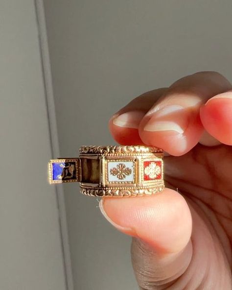 Mouse on Instagram: "RARE Georgian era (early 1800s period) wide band ring newly listed on the website. Here it is in action - amazing fabrication with the hinged panels in multi colored enamel opening to reveal gothic font letters on the inside. Special piece! 🐭 . . . . . . . . . #ringoftheday #jewelryaddict #jewelryobsessed #victorianrings #georgianrings #signetring #antiquering #poisonring #mourningring #mourningjewelry #locketring #locket #enamelring #antiqueenamel #museumjewelry #specialring #jewelsofdistinction #enameljewelry #floralring #ooak #ooakjewelry #ooakring #oneofakindjewelry #rarering #stackablerings #stackablebands #heavygold #wideband #georgianring #georgianjewelry" Thrifted Rings, Ring Locket, Georgian Ring, Dope Jewelry Accessories, Font Letters, Gothic Font, Locket Ring, Georgian Jewelry, Cute Engagement Rings