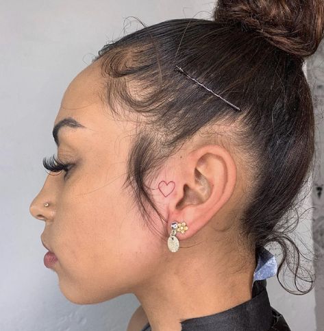 Female Small Face Tats, Heart Ear Tattoos For Women, Cute Tats Behind Ear, Heart Tattoo On Side Of Face, Baddie Tattoo Ideas Female Behind Ear, W A Y S Tattoo Behind Ear, Quotes Behind Ear Tattoo, Mini Ear Tattoos, Heart On Ear Tattoo