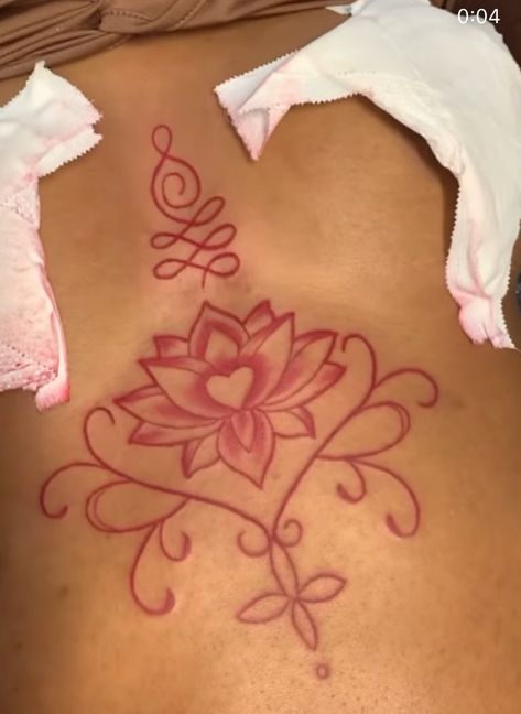 Brest Tattoos For Black Women, Spongebob Flower Tattoo Coi Leray, Baddie Tattoo Ideas Female Thigh, Tattoo Ideas In Between Breast, Pink Ink Tattoo On Dark Skin, Pink Tattoo On Brown Skin, Cute Female Tattoos, Tattoo Ideas Female Between Breast, Pretty Tattoos For Women Thigh Piece