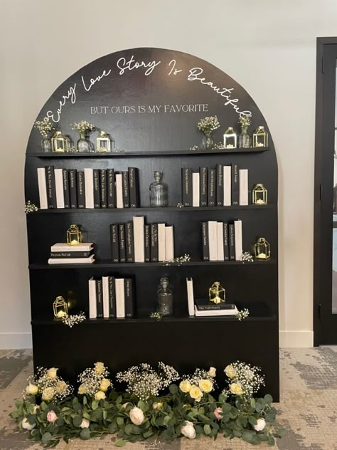 Each guest has their own book with their name and table number Seating Chart Book Theme, Book Shelf Seating Chart, Bookshelf Seating Chart Wedding, Bookcase Seating Chart, Bookshelf Seating Chart, Book Seating Chart Wedding, Bookshelf Seating, Wedding Bookshelf, Book Seating Chart