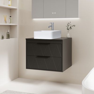 This wall-mounted bathroom vanity is not only a storage space, but also a symbol of life attitude. Select high-quality materials to create durable and refined products. The design is modern, simple but not simple, adding a different charm to your bathroom. The basin not only focuses on practicality and durability, but also pursues the perfect integration of aesthetic design, adding unique charm to the bathroom. The unique storage function makes full use of every inch of space to make your life m Bathroom Vanity With Vessel Sink, Wall Hanging Design, Wall Hanging Designs, Symbol Of Life, Unique Storage, Vessel Sink, Plumbing Fixtures, Aesthetic Design, 7 H