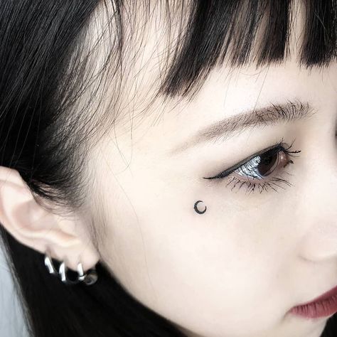 Subtle Face Tattoos, Cheekbone Tattoo, Tiny Face Tattoo, Moon Tattoo Face, Sparkle Face Tattoo, Feminine Face Tattoo, Moon Face Tattoo, Cute Face Tattoos, Woman Face Tattoo