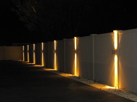 Is It Possible To Light Up Your Fence? - Straight Line Fence Outside Lights On Fence, Fence Wall Lighting Ideas, Lights For Fence Posts, Lights On Side Of House, Modern Fence Lighting, Light On Wall Ideas, Fence With Lighting, Fencing Lighting Ideas, Fence Lights Ideas