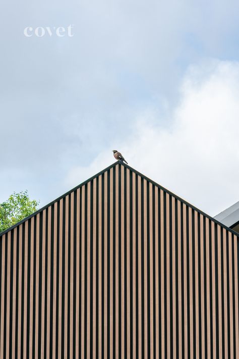 This striking residential facade in Camberwell, Victoria is clad in Ever Art Wood timber look aluminium battens. Precast Concrete House, Aluminium Battens, Timber Facade, Residential Facade, Wood Silhouette, Timber Battens, Precast Concrete, Park Photography, Concrete House