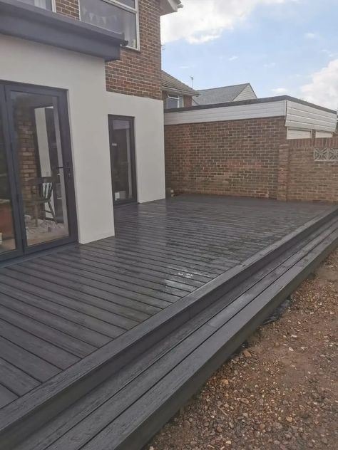 Garden Decking And Paving Ideas, Large Decking Area Ideas, Composite Decking Designs Patio, Black Garden Decking, Charcoal Composite Decking, Garden Design Decking, Garden Ideas Decking, Dark Grey Decking Ideas, Outside Decking Ideas