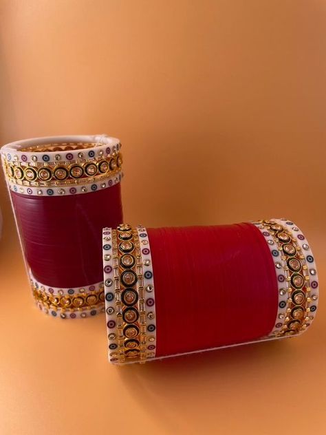 Available in sizes 2.4, 2.6, and 2.8. All of our chura sets come in a gold box and have never been worn or tried on. Free Shipping #churi #indian #bangladesh #usa #bangle #traditional Traditional Chooda Punjabi Bride, Red Choora Designs, Dark Red Choora, Bridal Jwellery Trending 2024, Chooda Designs Punjabi, Chura Designs Bridal, Chura Bridal Punjabi Bride, Chooda Designs Brides, Choora Designs