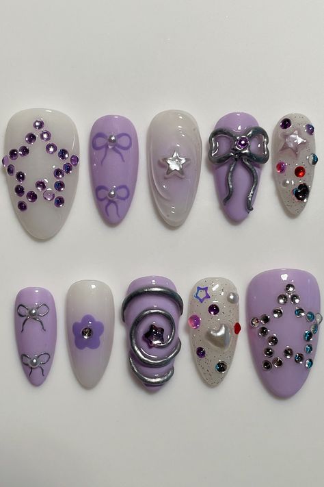 olivia rodrigo, olivia rodrigo aesthetic, sour nails, sour album nails, olivia rodrigo nails, guts nails, nails inspired by guts, olivia rodrigo guts, guts aesthetic, olivia rodrigo aesthetic, lilac nails, olivia rodrigo purple nails Purple Nail Art Designs Acrylics, Purple Funky Nails, Nail Art Purple Designs, Nail Bow Designs, Girly Gel Nails, Simple Nails With Charms, Purple Cute Nails, Purple Gel X Nails, Nails Asthetics