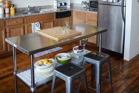 Stainless Steel Table Kitchen, Stainless Steel Prep Table Island, Stainless Steel Island With Seating, Stainless Steel Prep Table In Kitchen, Stainless Steel Island Kitchen, Metal Island Kitchen, Old And New Kitchen, Kitchen Island Stainless Steel, Stainless Steel Kitchen Table