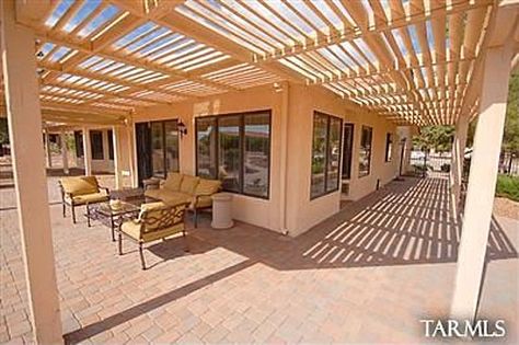 Wrap Around Pergola! Pergola Wrap Around House, Wrap Around Concrete Patio, Wrap Around Pergola Porch, Wrap Around Patio Ideas, Wrap Around Pergola, Wrap Around Patio, Pergola Garage Door, Concrete Backyard, Fluffy Flowers