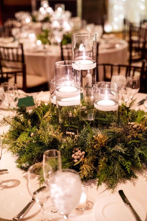 Candlelit Winter Mountain Wedding | Vail Real Wedding | Item 30 Winter Green Centerpiece Wedding, Winter Wedding Table Centerpieces Simple, Winter Wedding Centerpieces Rectangle Table, Viking Wedding Winter, Winter Green Wedding Theme, Christmas Table Decorations Wedding, Winter Wedding Center Piece, Winter Wedding Tablescapes Round, December Wedding Centerpieces Receptions