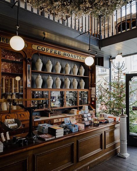 Dark Interiors Restaurant, Gothic Shop Interior, Moody Bakery Interior, Historic Coffee Shop, Vintage Bar Room, Apothecary Cafe Coffee Shop, Parisian Cafe Interior Design, Most Beautiful Coffee Shops, 1920s Coffee Shop