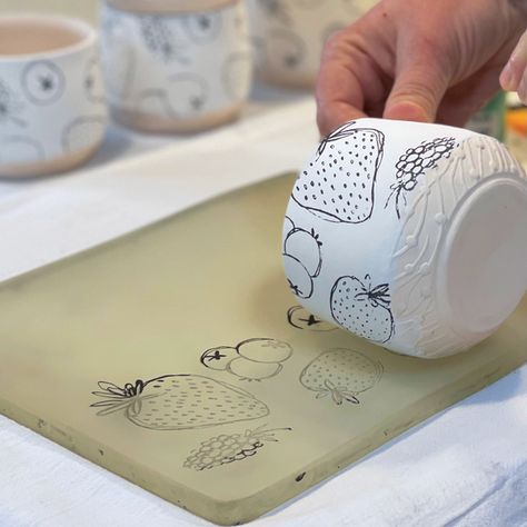 A Slick Way to Transfer Printed Designs onto Curved Surfaces Printing On Pottery, Raku Glaze Ideas, Clay Surface Design, Pottery Surface Design, Slip Transfer Pottery, Pottery Painting Techniques, Ceramic Glazing Techniques, Slabs Ceramics Ideas, Marbled Clay Pottery