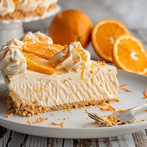 No-Bake Orange Creamsicle Cheesecake Orange Creamsicle Cheesecake Recipe, Orange Creamsicle Cheesecake, Orange Cheesecake Recipes, Creamsicle Cheesecake, Cheesecake With Whipped Cream, Mini Cheesecake Bites, Frozen Cheesecake, Swirl Cheesecake, Lemon Pound Cake Recipe