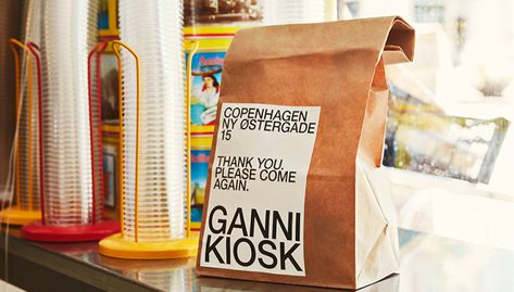 GANNI's Hits Our Sweet Spot with Upcycled Merch Made by Female Creatives | TheArtGorgeous Ganni Packaging, Pop Up Kiosk, Ganni Branding, Burger Packaging, Cafe Branding, Copenhagen Fashion, Brand Creation, Copenhagen Style, Copenhagen Fashion Week