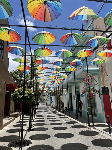 Umbrella Street, Calle San Felipe in Puerto Plata. Republica Dominicana Aesthetic, Dominican Republic Puerto Plata, Amber Cove, Latin Countries, Dominican Republic Vacation, Puerto Plata Dominican Republic, Umbrella Street, Dominican Republic Travel, Events Place