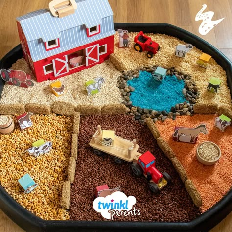 This is a popular play tray idea that also encourages lots of fun learning at the same time.  Create your very own farm using a different type of cereal for each field. Use our farm small world characters alongside any additional toys such as barns or tractors.   When positioning the small world characters, make sure you distance the mummy animals from their babies. Then encourage your children to help pair them up again. Farm Imaginative Play, Tractor Tuff Tray Ideas, Tractor Tuff Tray, Farm Tough Tray Ideas, Farm Messy Play Ideas, Farm Animal Tuff Tray, Farm Tough Tray, Farm Animals Tuff Tray Ideas, Farm Animals Tuff Tray