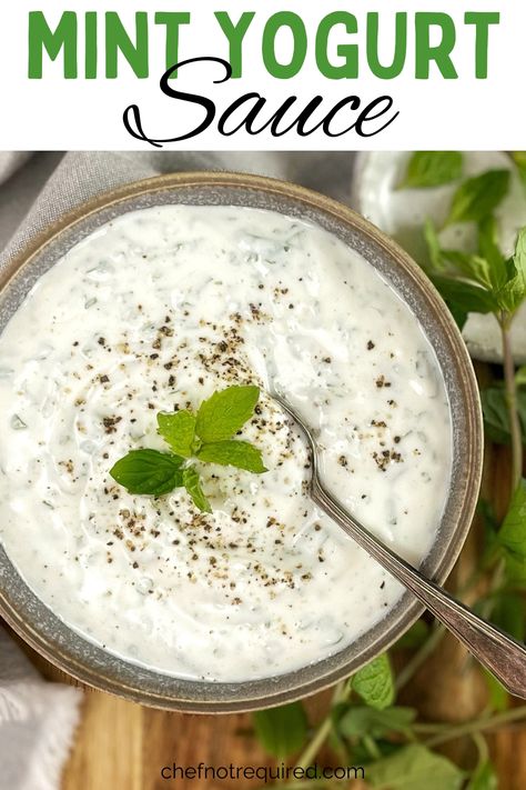 Creamy yogurt sauce in a gray bowl with mint and a spoon on a wooden board. Mint Yogurt Sauce Indian, Mint Yogurt Sauce For Lamb, Yogurt Sauce For Lamb, Yogurt Sauce Recipe, Mint Yogurt Sauce, Creamy Dipping Sauce, Yogurt Dipping Sauce, Lamb Sauce, Greek Yogurt Sauce