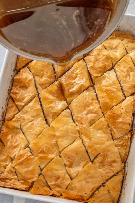 Crunchy and crispy layers of buttery phyllo dough and walnuts topped with a sweet cinnamon honey syrup. Filo Recipes, Greek Baklava Recipe, Greek Baklava, Phyllo Dough Recipes, Recipes Greek, Greek Appetizers, Baklava Recipe, Cinnamon Honey, Walnut Recipes