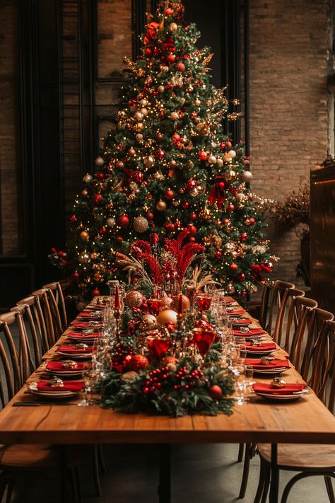 Elegant Christmas dining table adorned with red, green, and gold decor, illuminated by a glowing tree in the background. Green And Gold Decorations, Christmas Table Arrangements, Christmas Table Setup, Red Table Settings, Twinkling Tree, Banquet Table Decorations, Gold Table Setting, Vintage Table Setting, Christmas Party Table