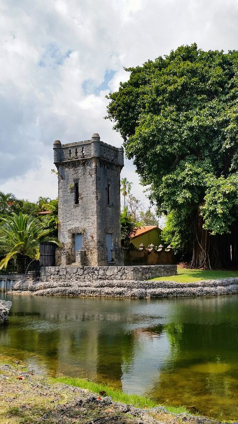 Top 5 Places to Take Engagement Photos in Coral Gables - Coral Gables Love Courtyard With Fountain, Mediterranean Revival Architecture, Potted Palm Trees, Open Courtyard, Large Fountain, Mediterranean Revival Style, Green Painted Walls, Coral Gables Florida, Biltmore Hotel