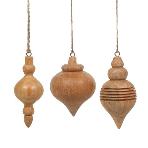 Add a touch of rustic elegance to your holiday decor with our set of 3 handcrafted mango wood finial ornaments, made in India. Each ornament is carefully carved by skilled artisans, showcasing the natural beauty and rich grain of mango wood. The unique finial shapes add a classic and sophisticated touch to your Christmas tree, wreaths, or garlands, blending seamlessly with various decor styles. These ornaments are perfect for creating a warm, inviting atmosphere during the holiday season, offeri Candle Holders Wall Decor, Holiday Wall Art, Outdoor Accent Table, Lathe Projects, Candle Tree, Wall Candle Holders, Wood Turning Projects, Wood Lathe, Christmas Ornament Sets