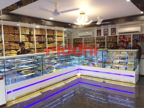 Another Sweet Display Counter Installation with Blue Lighthing @ Shree Ram Sweet Adipur  #SweetDisplayCounter #DisplayCase #ShreeRamSweet #Adipur #RiddhiDisplay Cake Display Counter, Interior Showroom, Shop Counter Design, Glass Counter, Sweet Display, Pastry Display, Display Counter, Shop Window Stickers, Fruit Shop