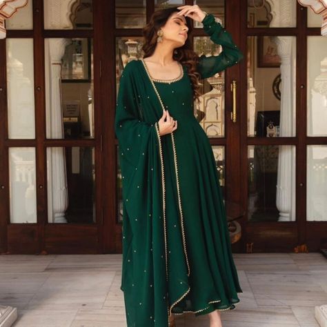 *GREEN HANDWORK ANARKALI 💚🌸✨* for order what's app 7997018094 Price 1299/- Be The Talk Of The Town With This Beautiful Handwork Anarkali With Dupptta! This piece is made from Fox Georgette Fabric with a beautiful intricate motif zari Handwork, creating an elegant and eye-catching look. The Dress is the perfect way to make a statement and show off your impeccable sense of style. Get your hands on this must-have set and elevate your wardrobe to the next level! *DETAILS* ✓Material:- Fox Ge... Dark Green Anarkali Suits, Dark Green Anarkali, Anarkali Gown With Dupatta, Farasha Abaya, Asian Suits, Readymade Blouses Online, Green Anarkali, Eid Dress, Georgette Anarkali