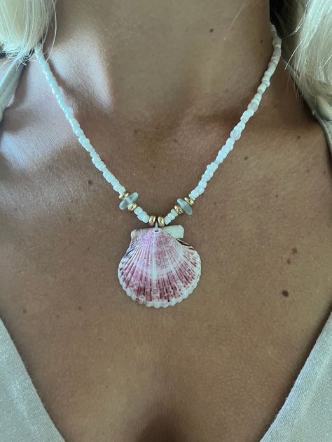 Beautiful handmade seashell necklace made with blue seaglass and pink scallop shells found here in Southwest Florida! Homemade Seashell Necklace, Necklace Hand Made, Seashell Jewelry Diy Necklaces, Mermaid Core Accessories, Things To Make Out Of Shells, Pearl Shell Necklace, Handmade Shell Jewelry, She’ll Necklace, Beaded Shell Necklace