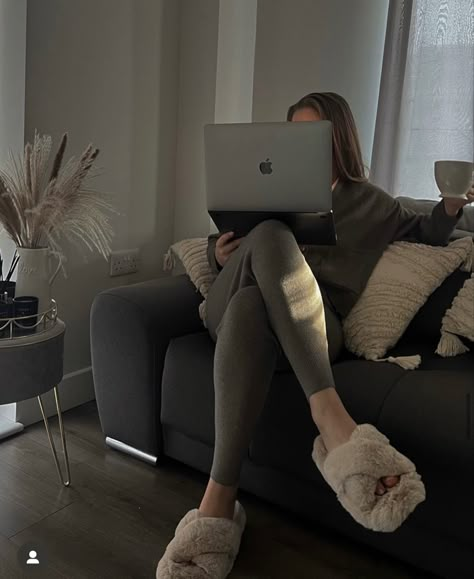 A Woman, Couch, Laptop, Computer