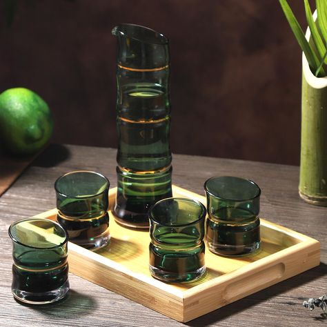 PRICES MAY VARY. 【Handmade Bamboo Design, a Sence of Constancy】Japanese bamboo symbolizes longevity, courage, and constancy. Our sake sets are handmade by skilled craftsmen. And sake set is made of high-grade crystal glass, heavy & textured. Each one is a work of art and special. You will enjoy the beauty of this sake set while drinking. 【Crystal Glass Design, Both Enjoyment of Visual and Taste】Creative green crystal glass design with bamboo shape, and beautiful lines of the bottle mouth. You ca Sake Aesthetic, Rubi Aesthetic, Japanese Table Setting, Bamboo Bottle, Japanese Cutlery, Bamboo Gifts, Bamboo Cups, Sake Cups, Japanese Home Decor