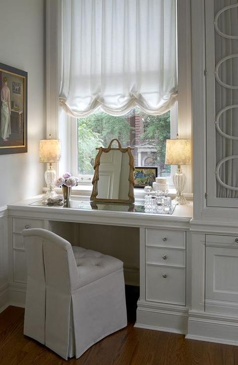 Elegant dressing room features a mirrored top makeup vanity, placed under window dressed in a white ruched shade, topped with a gold tasseled mirror paired with a tufted vanity stool. Bedroom Window Dressing, Closet With Vanity, Bathroom Vanity Stool, Built In Vanity, Closet Vanity, Dream Closets, Design Room, Room Closet, Bedroom Windows