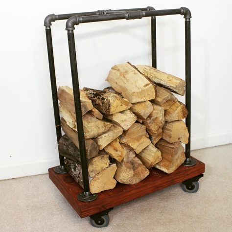 Here is a heavy-duty firewood cart that will easily roll on carpets and hardwood floors. It works great and makes wood storage much cleaner and easier. If you want to build one, I made a simple video of the process.  Just follow the link. Wood Storage On Wheels, Firewood Cart, Firewood Basket, Wood Cart, Firewood Holder, Simple Video, Firewood Rack, Firewood Storage, Wood Rack