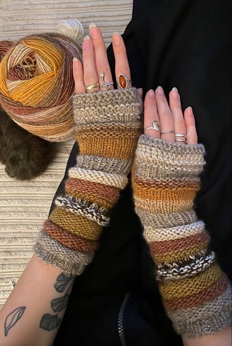 East Knit Projects, Hand Warmers Knitting Pattern, Punk Knitting, Crochet Striped Scarf, Knitting Leg Warmers, Goblincore Crochet, Fall Scarf Crochet, Hand Warmers Crochet, Arm Warmers Crochet