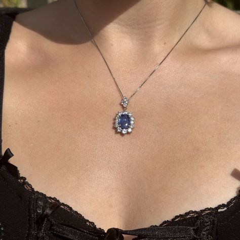 New in! A marvellous sapphire diamond pendant necklace boasting a deep-blue cushion cut sapphire in the centre, weighed at 2.91 carats. It’s complemented by a frame of twelve bright, clean brilliant-cut diamonds and four more on the bale above. They have excellent VS1 clarity - H colour and total 2.57 carats. The pendant is fashioned in 900 platinum and features a fancy, basket under-gallery on the reverse, stamped with the stone weights. It’s accompanied by a silky box chain to display it ... Blue Gem Necklace, Diamond Locket, Sapphire Diamond Pendant, No Code, Layered Jewelry, Blue Gems, Sapphire Necklace, Sapphire Jewelry, Precious Gems