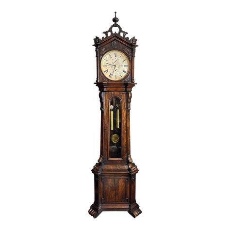 This listing is for a gorgeous antique Scottish grandfather/ long case clock.  This piece is by John and William Mitchell of Glasgow (Scotland) circa 1830s.  The case is quite unique as it was made in an ornate gothic revival style.  The clock has a glass windowed mid- section, silver plated dial, and bright brass hardware,  as typical for the Regency Period.  The case has ornate flowing carvings throughout and has a nice spire on top.   The movement is an 8 day time and strike with a visible se 1890s Decor, Scottish Gothic, Grand Father Clock, Gothic Clock, Coocoo Clock, Victorian Clock, Ornate Window, William Mitchell, Grandmother Clock