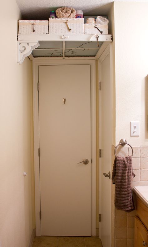 Bathroom Shelf/Storage - Took the "shelf above a door" idea a little further.  I used an antique window frame and backed it with a painted piece of plywood.  Set it on top of the door frames and placed the brackets on the left.  The baskets complete the look and there's 3' of storage space above your head when you walk into the bathroom. Above Door Shelf, Over Door Shelf, 2024 Growth, Over The Sink Shelf, Bathroom Door Ideas, Antique Window Frames, Shelves Above Toilet, Bathroom Upstairs, Over Toilet Storage