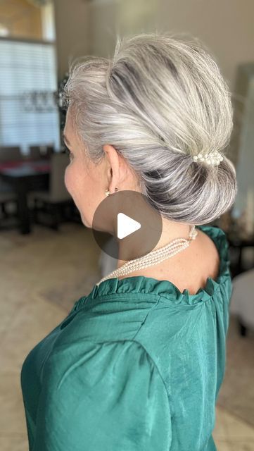 Missy on Instagram: "Edit- see the additional post on my profile for product info and tips and tricks for styling! 🤍 Bringing this one back! Chignon Tutorial!!! This is such an easy look to accomplish. Use a stretchy elastic headband  with a nonslip silicone strip and roll your hair around it. Add a decorative clip or comb and you have an elegant, easy hairstyle. If you find the hair and wants to slip, add a few bobby pins to secure it. What I love most about it is I can easily tighten or adjust the style by removing the comb and rolling the hair tighter. 🤍🤍🤍 Perfect for a wedding or a fancy dinner, or a day at work. * *  #bun  #chignons #updo #howtobeauty  #fauxchignon #chignon #howto #tutorial #hairstyletutorial #embracingthegray #gray #grey #longhair #naturalgrayhair #grayhair #grey Updos For Gray Hair, Do It Yourself Hair Updo Simple, Easy Pretty Updos For Long Hair, Back Combing Hair Tutorial, Updos Using Hair Combs, Updos For Gray Hair Over 50, Look At This... 👀, Diy Curly Updo Easy, How To Do A Donut Bun